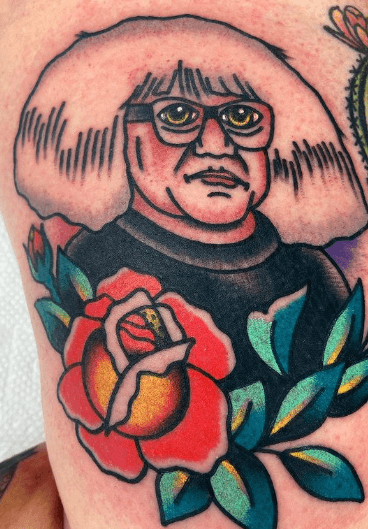 Tattoo of Danny Devito as Ongo Gablogian, art collector.