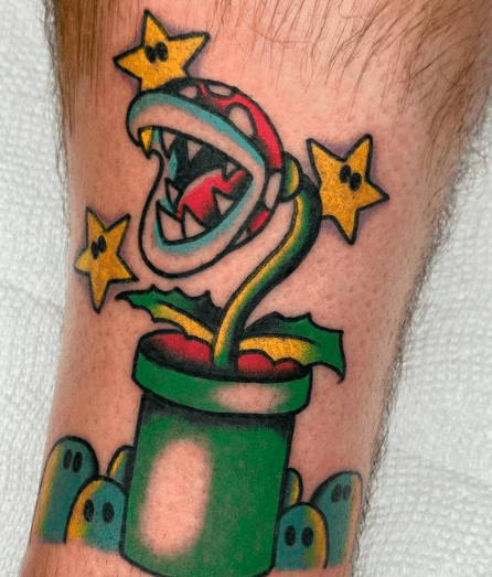 Tattoo of a piranha plant from the Super Mario Bros. video game.